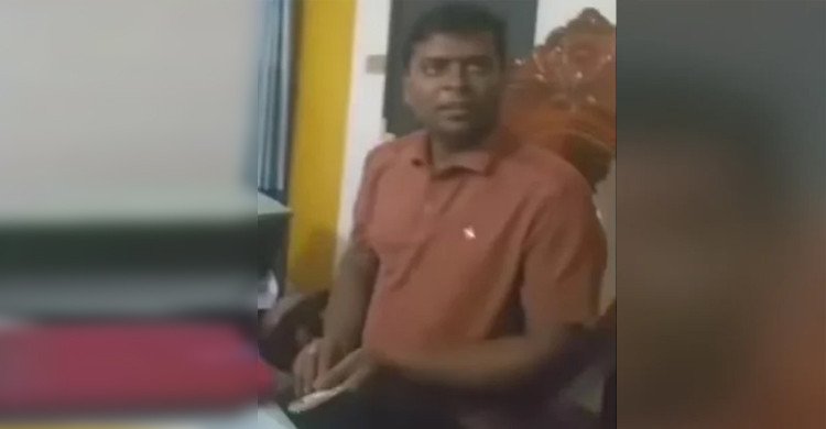 টেবিলের নিচে টাকা গুনে মানিব্যাগে রাখার ভিডিও ভাইরাল, পুলিশ কর্মকর্তা প্রত্যাহার