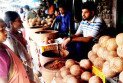 দুর্গাপূজা ঘিরে দিনাজপুরে নারিকেল-গুড়ের বাজার জমজমাট, কমেছে দাম